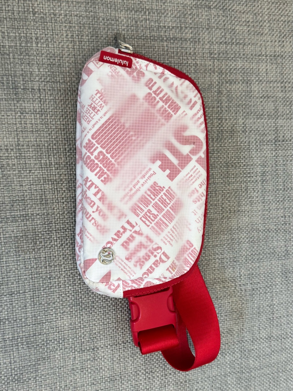 lululemon athletica Kids Red and White Newspaper Print Belt Bag